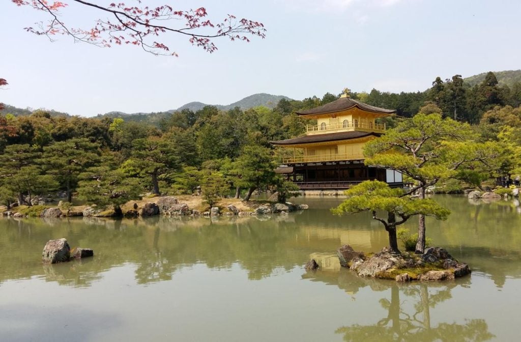Kinkakuji Temple surrounded by water in Kyoto, Japan.