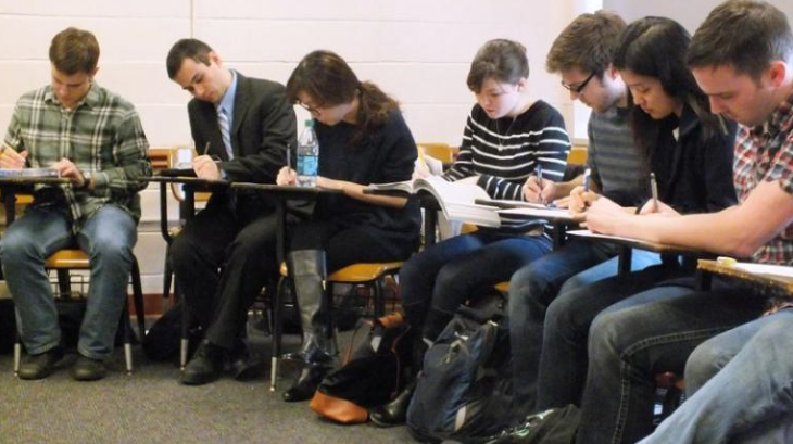 Students taking an exam.