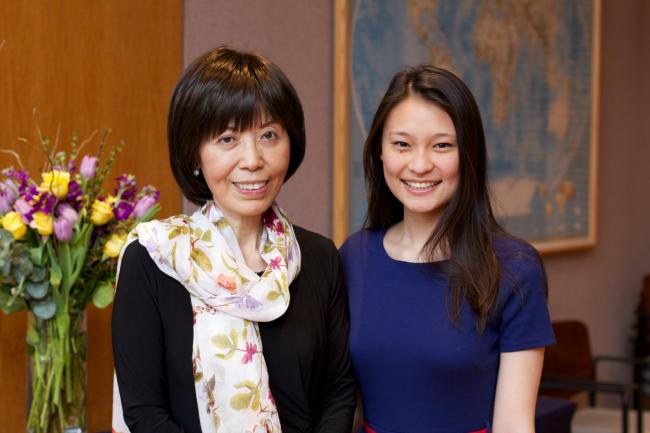 Professor Yu with a student