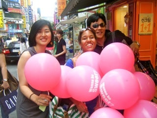 Students with balloons.